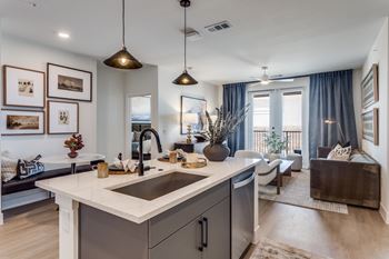 Gourmet prep islands with pendant lighting*